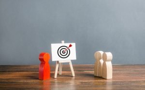 a graphic showing a series of figurines talking about target audiences